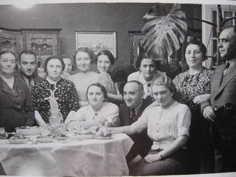 Fig. 21. My father’s family, 1930. From left: My paternal grandmother Feiga Weissberg. Next to her are my father, father’s aunt Liza Rapaport, unknown woman, my mother, father’s sister Lola, Lena Jurand, Mina Weissberg (Izak’s wife). Sitting in the front row: my father’s brother Izak flanked by Tosia and Ziuta.